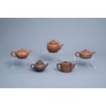 Five Chinese Yixing stoneware teapots and covers, 20th C.