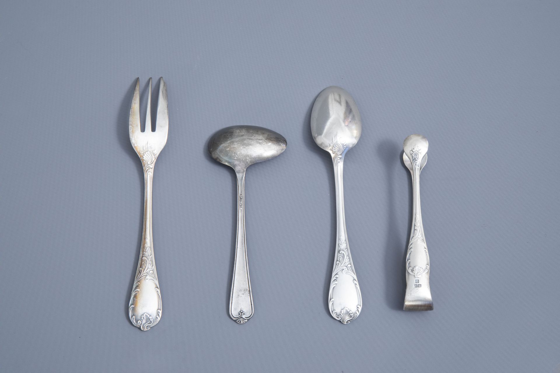 A French 65-piece silver plated rococo style cutlery set, model Marly, Christofle, 20th C. - Image 3 of 32