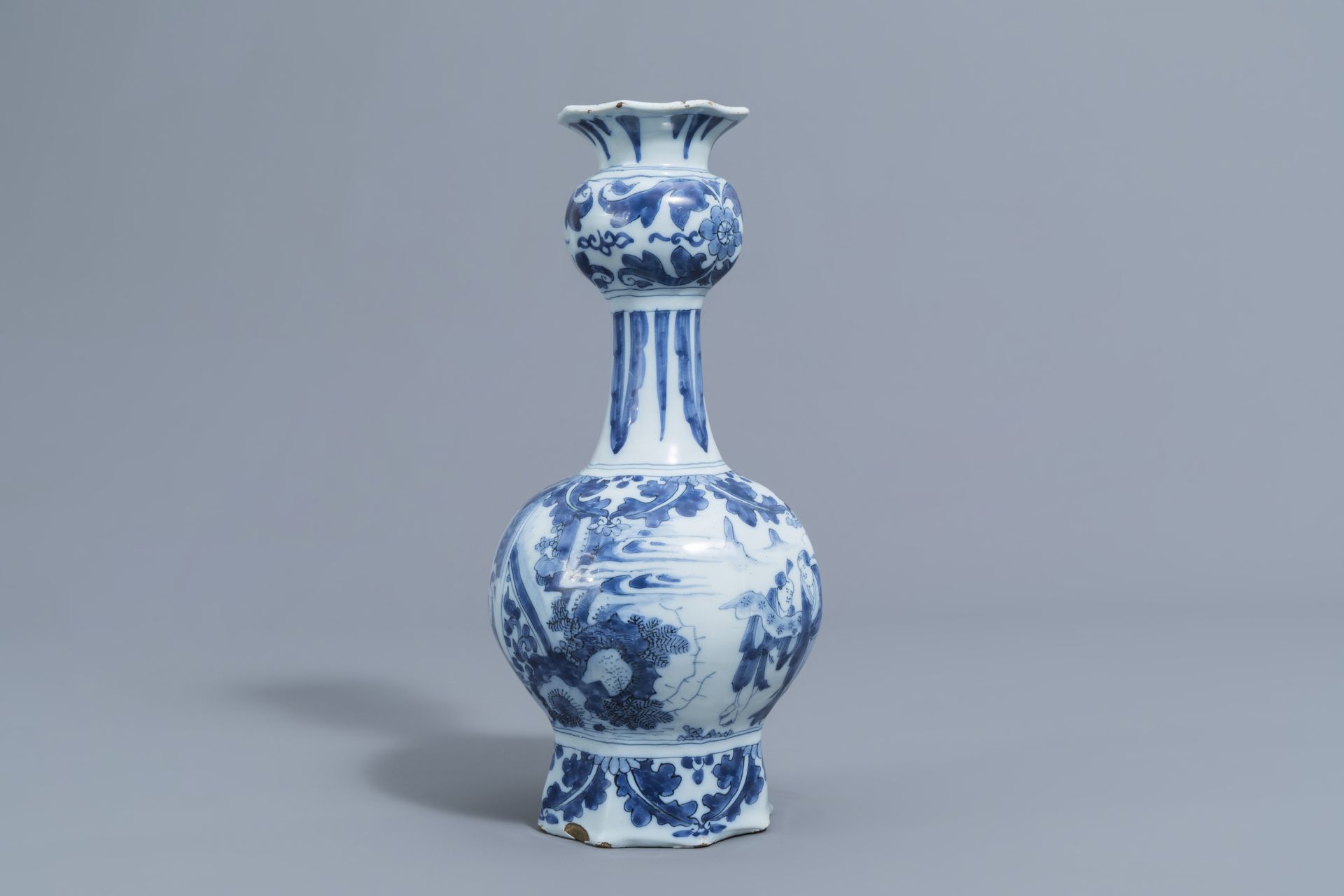 A Dutch Delft blue and white 'chinoiserie' garlic neck bottle vase, late 17th C. - Image 4 of 6