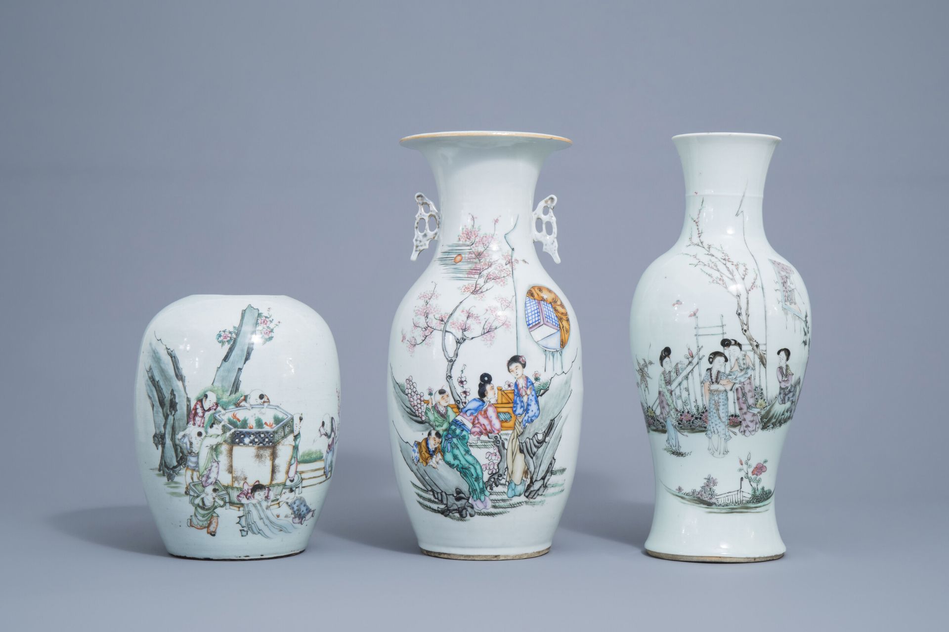 Two Chinese famille rose vases and a ginger jar with figures in a garden, 19th/20th C.