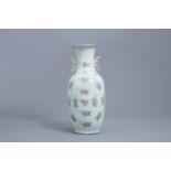 A Chinese famille rose vase with floral design, 19th C;