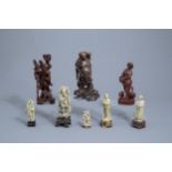 Five Chinese soapstone figures and three in carved wood, 19th/20th C.