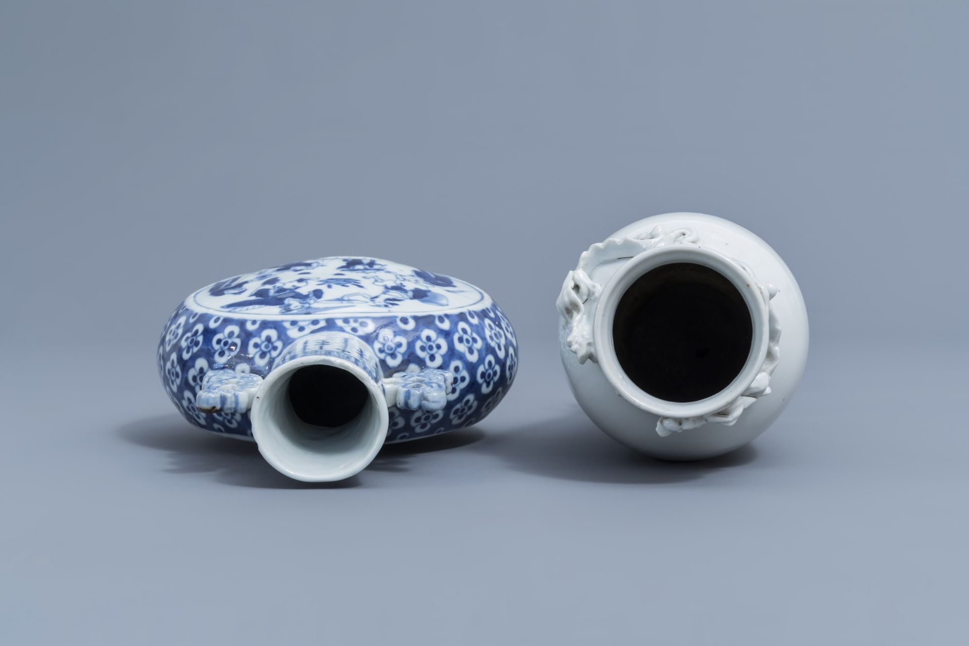 A Chinese blue and white moonflask and a blanc de Chine vase with dragon relief design, 19th C. - Image 5 of 6