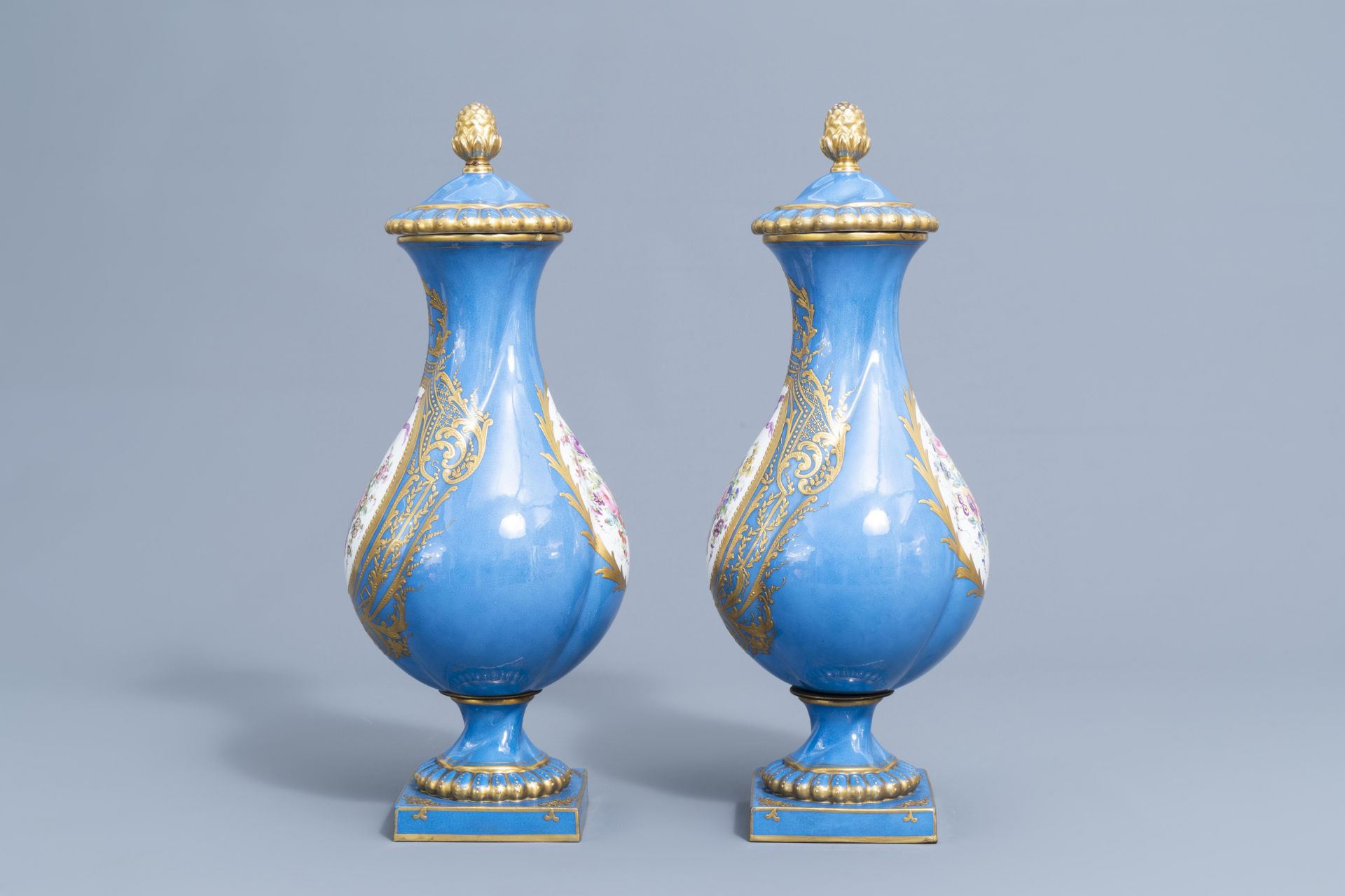 A pair of French 'bleu celeste' Svres manner vases and an Empire style centrepiece, 19th/20th C. - Image 9 of 28