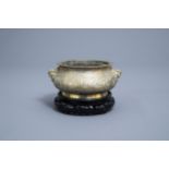 A Chinese brass censer with figurative design all around, Xuande mark, ca. 1900