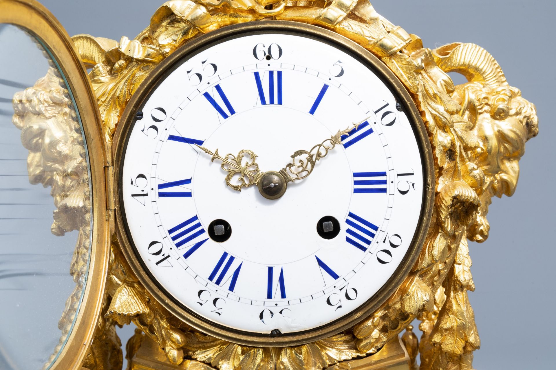 A French gilt bronze mounted Sevres style clock and a pair of Louis XV style candelabra, 19th C. - Image 9 of 23