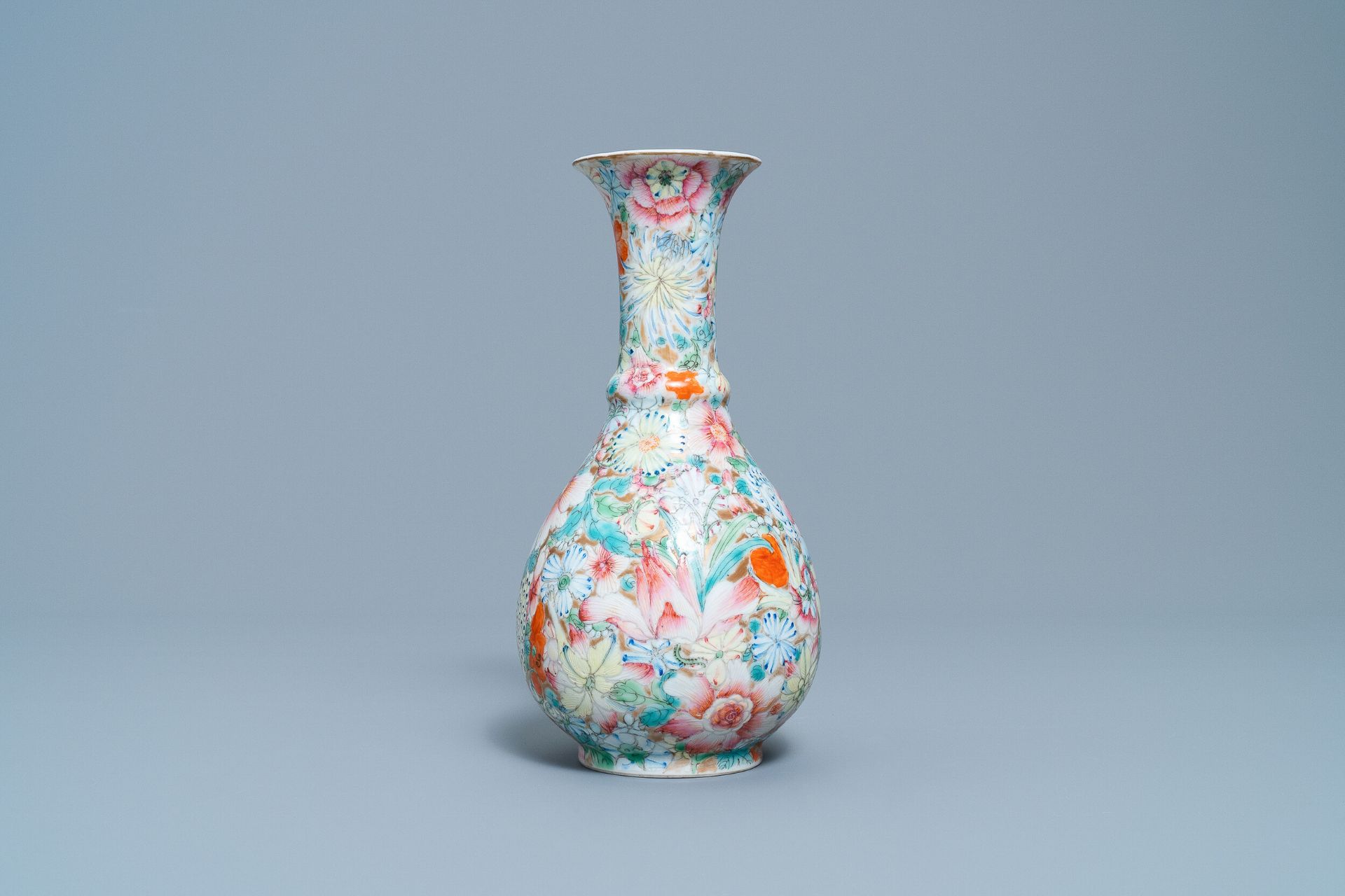 A Chinese famille rose 'millefleurs' vase, Qianlong mark, Republic, 20th C.