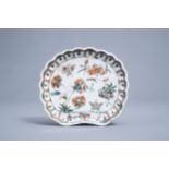 A Chinese shell shaped famille verte dish with floral design, Kangxi
