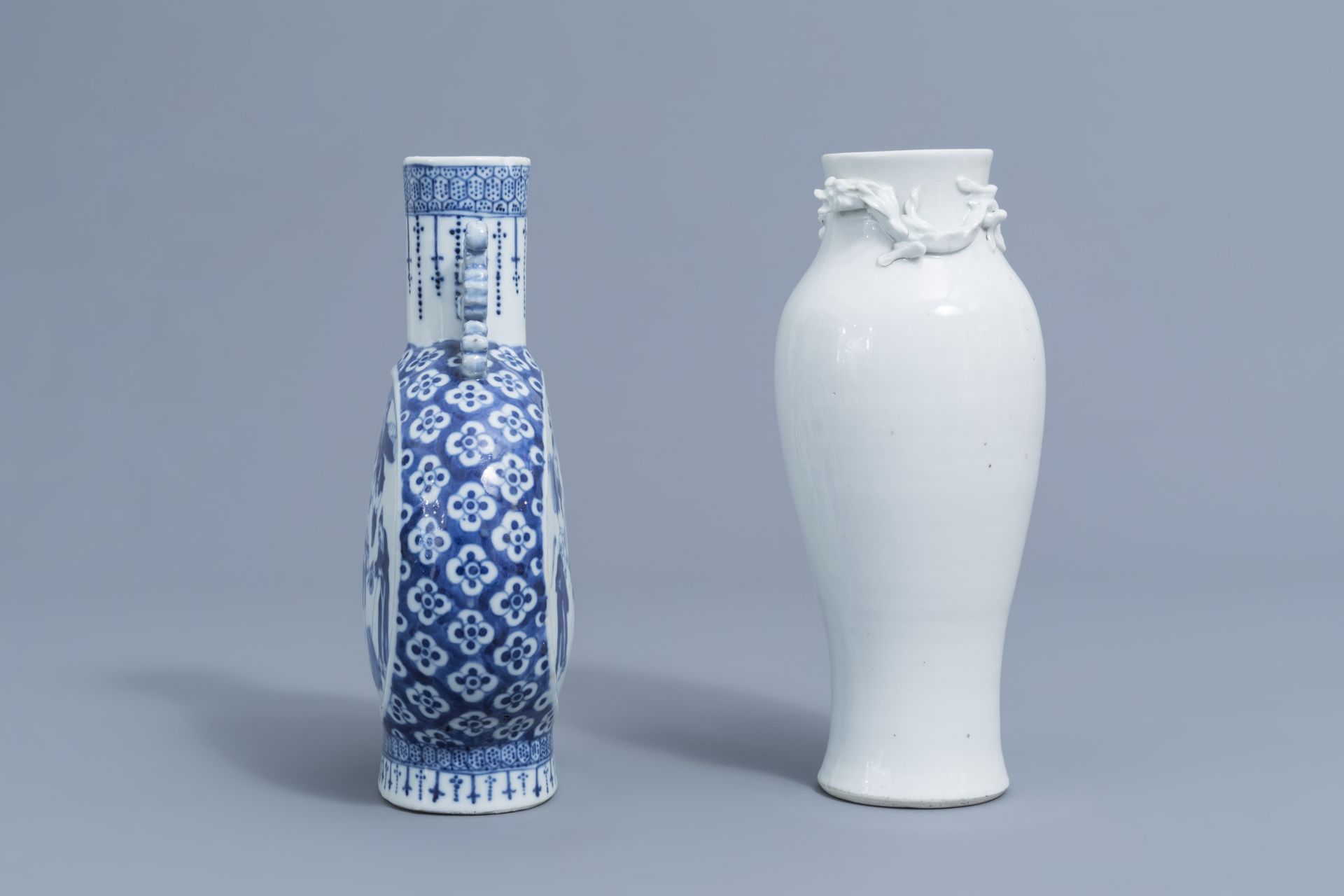 A Chinese blue and white moonflask and a blanc de Chine vase with dragon relief design, 19th C. - Image 4 of 6