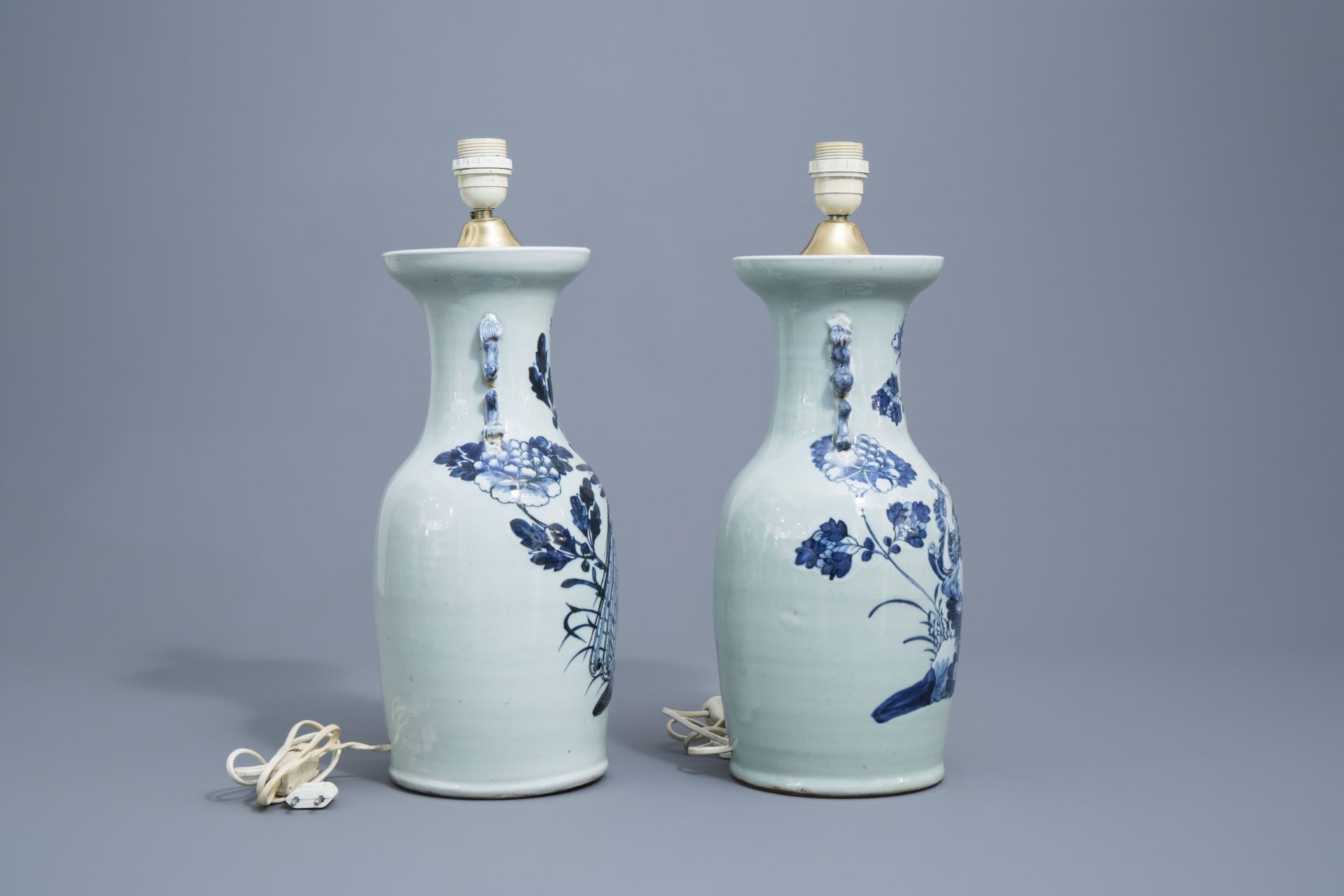 A Chinese blue and white landscape vase and four celadon vases, 19th/20th C. - Image 9 of 13