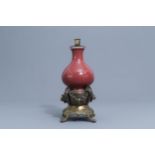 A Chinese monochrome sang de boeuf lamp-mounted vase, Qianlong mark and prob. period