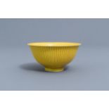 A ribbed Chinese monochrome yellow bowl, Yongzheng mark, 19th/20th C.