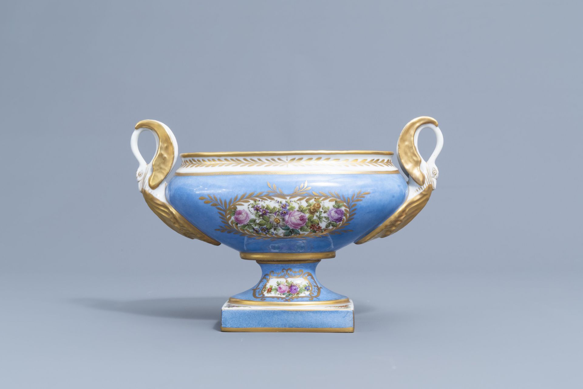 A pair of French 'bleu celeste' Svres manner vases and an Empire style centrepiece, 19th/20th C. - Image 18 of 28