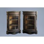 A pair of French gilt mounted tortoiseshell and brass marquetry Boulle cupboards, 19th C.