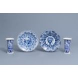 Two Dutch Delft blue and white chargers and two vases, 18th/19th C.