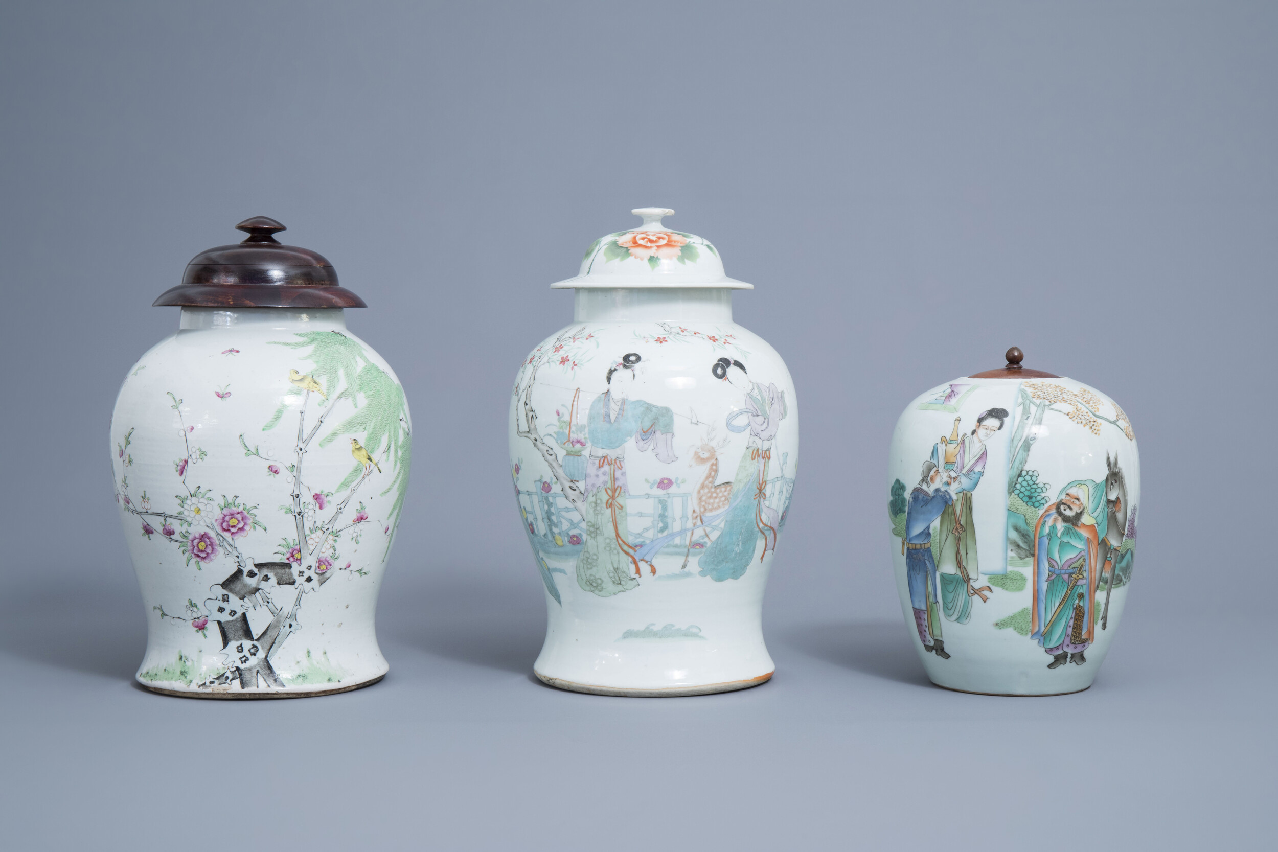 Two Chinese famille rose and qianjiang cai vases and covers and a ginger jar, 19th/20th C.