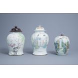 Two Chinese famille rose and qianjiang cai vases and covers and a ginger jar, 19th/20th C.