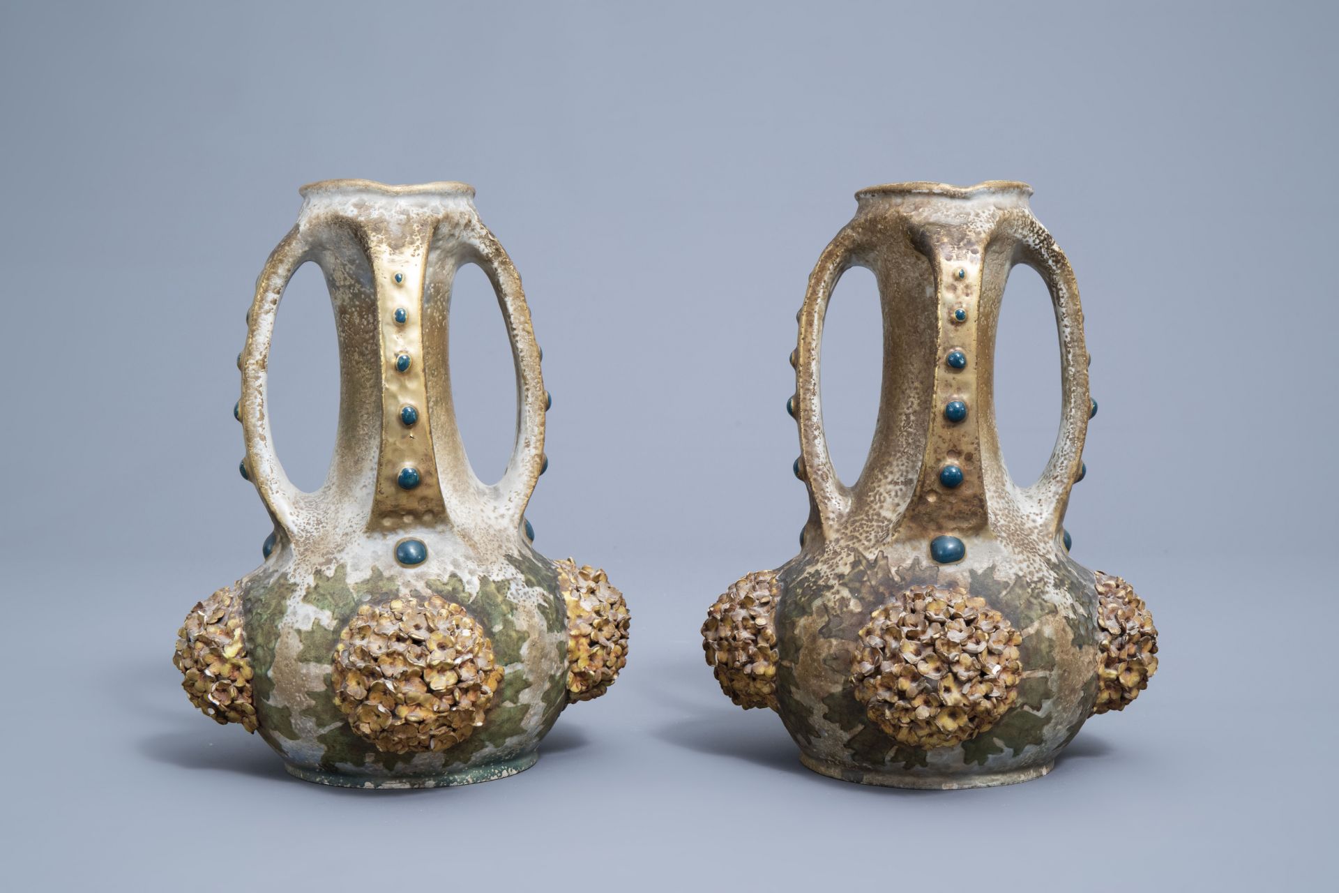 A pair of polychrome, gilt and iridescent Amphora Austria Art Nouveau vases, early 20th C. - Image 6 of 20