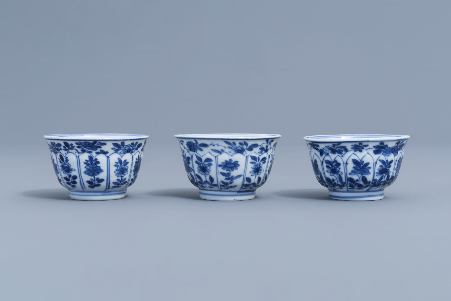 Three Chinese blue and white cups and saucers with floral design, Kangxi - Image 6 of 9