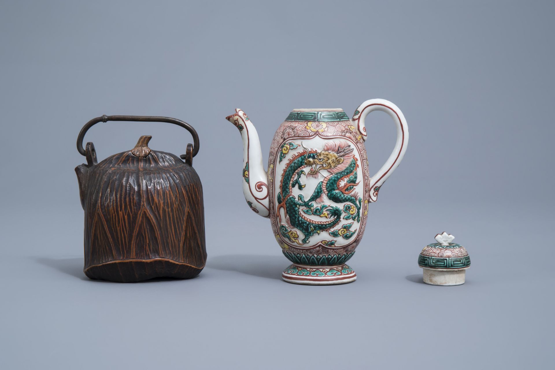 A Japanese Satsuma teapot and cover and one in carved wood, Meiji, 19th/20th C. - Image 5 of 8