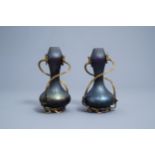 A pair of iridescent Art Nouveau style double gourd vases in the manner of Johann Loetz, 20th C.