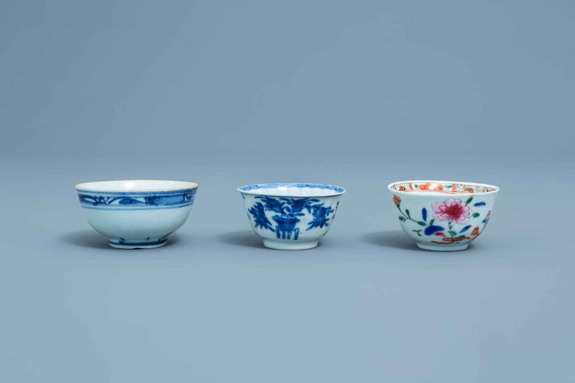 Three Chinese blue, white and famille rose cups and three saucers, Kangxi and later - Image 8 of 18