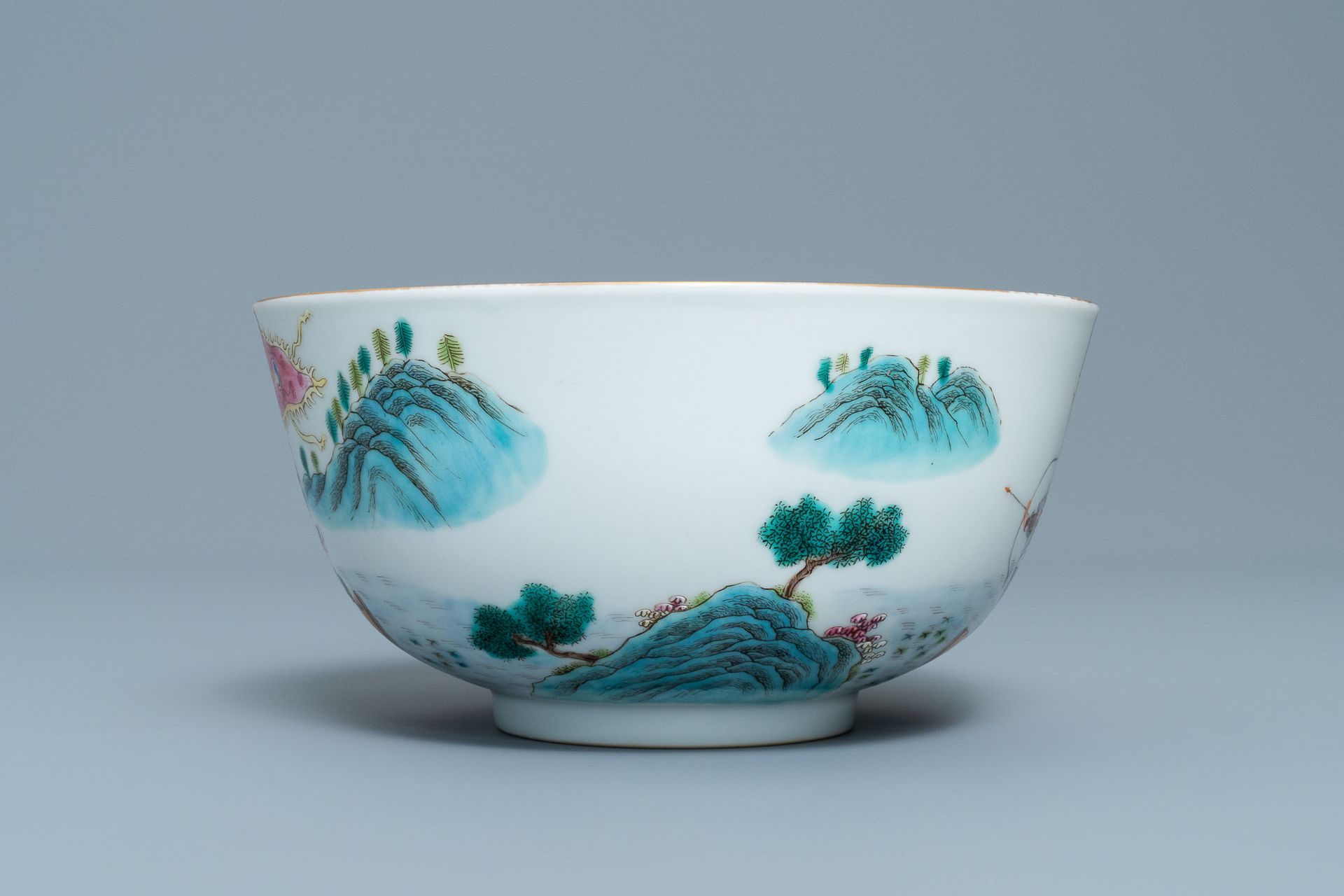 A fine Chinese famille rose bowl with figures in a river landscape, Qianlong mark, 20th C. - Image 3 of 7