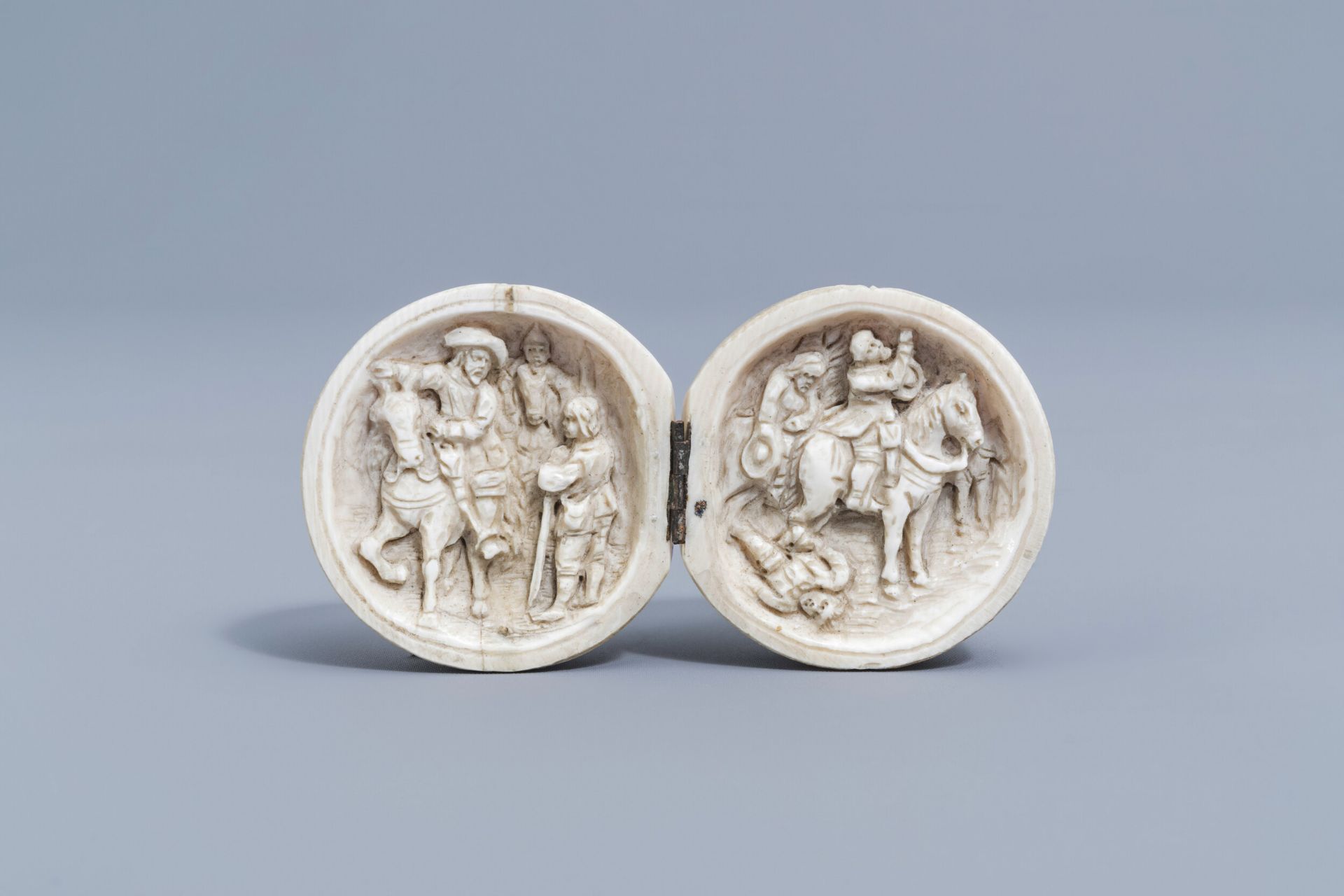 A French ivory prayer-nut or diptych ball carving with figurative design, probably Dieppe, 19th C.