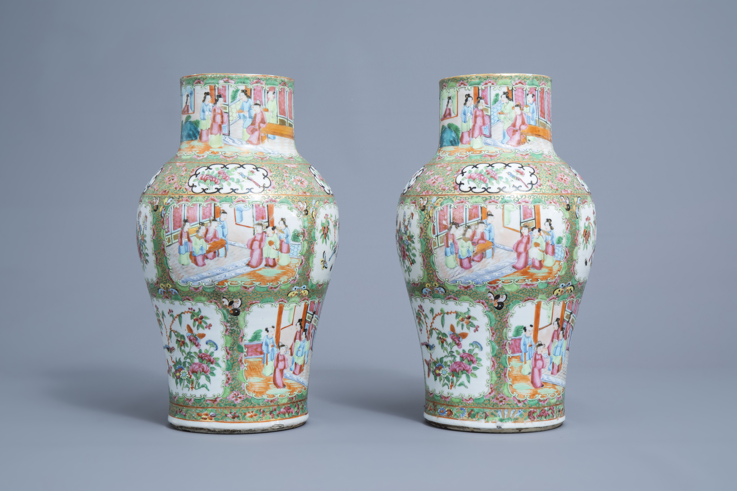A pair of Chinese Canton famille rose vases and covers, 19th C. - Image 2 of 14