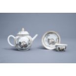 A Chinese grisaille, gilt and iron red teapot, cup and saucer with a couple in love, Qianlong