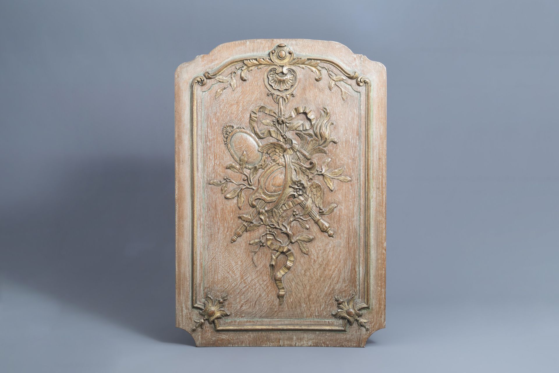 A French carved wooden Louis XV panel with ribbons and acanthus leaves, 18th C.