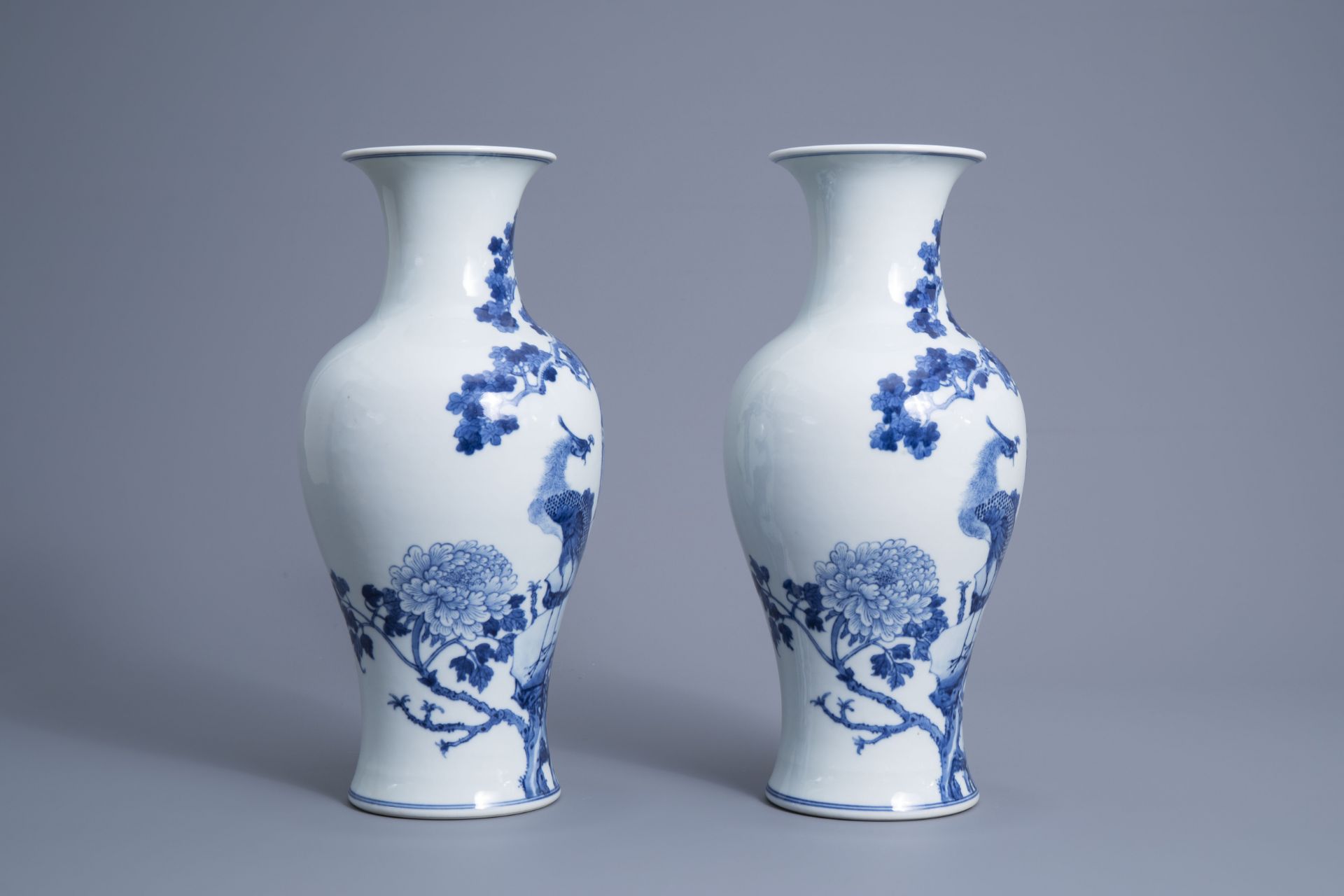 A pair of Chinese blue and white 'phoenix' vases, Republic, 20th C. - Image 2 of 6