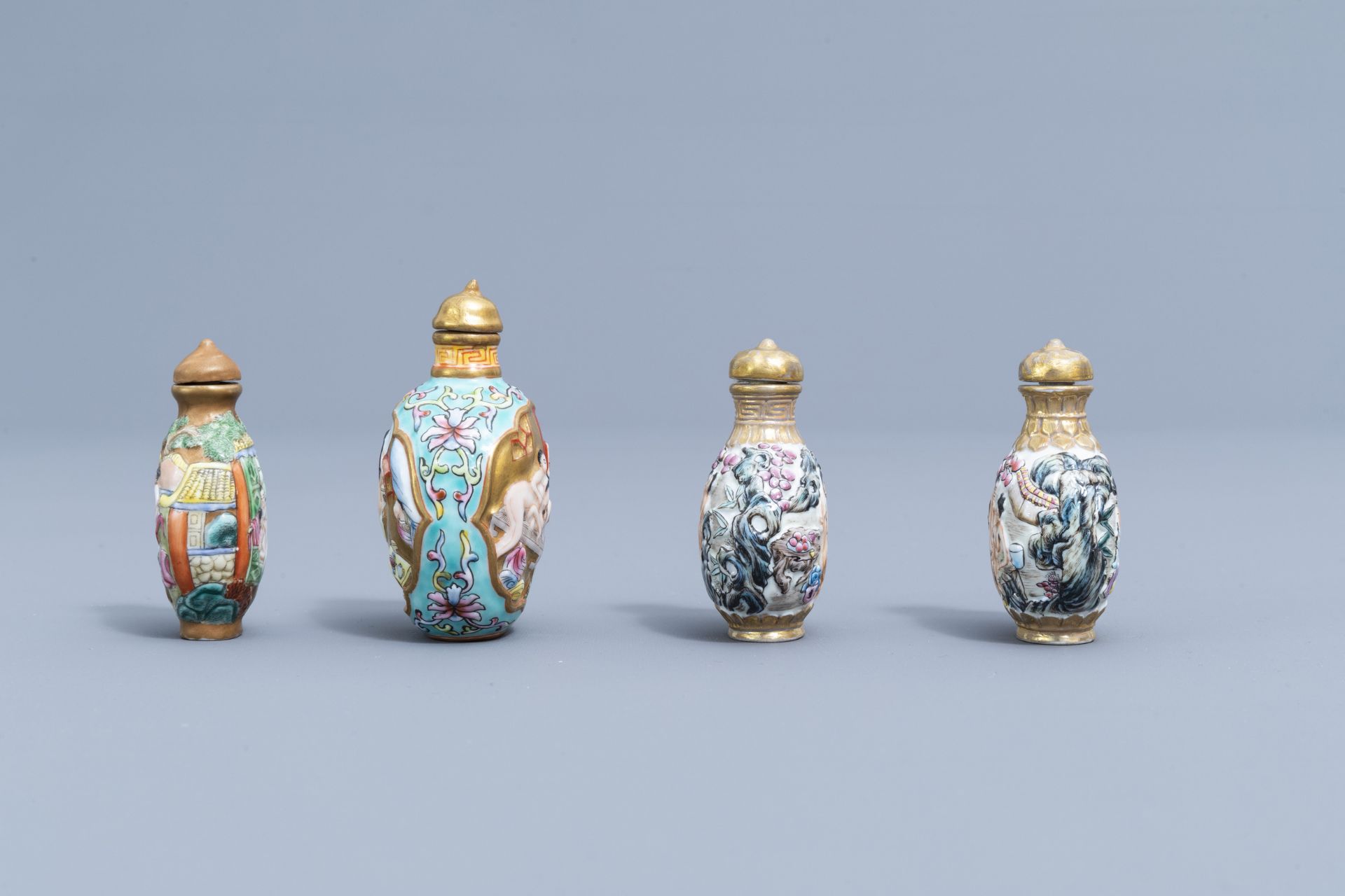 Eight Chinese erotical porcelain, glass and Canton enamel snuff bottles, 20th C. - Image 4 of 4