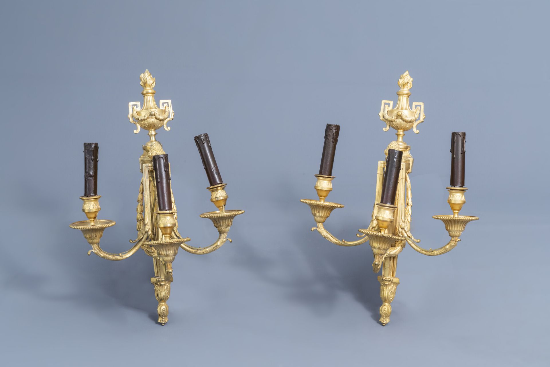 A pair of French Louis XVI ormolu lights in the manner of Jean-Charles Delafosse (1734-1789), 18th C