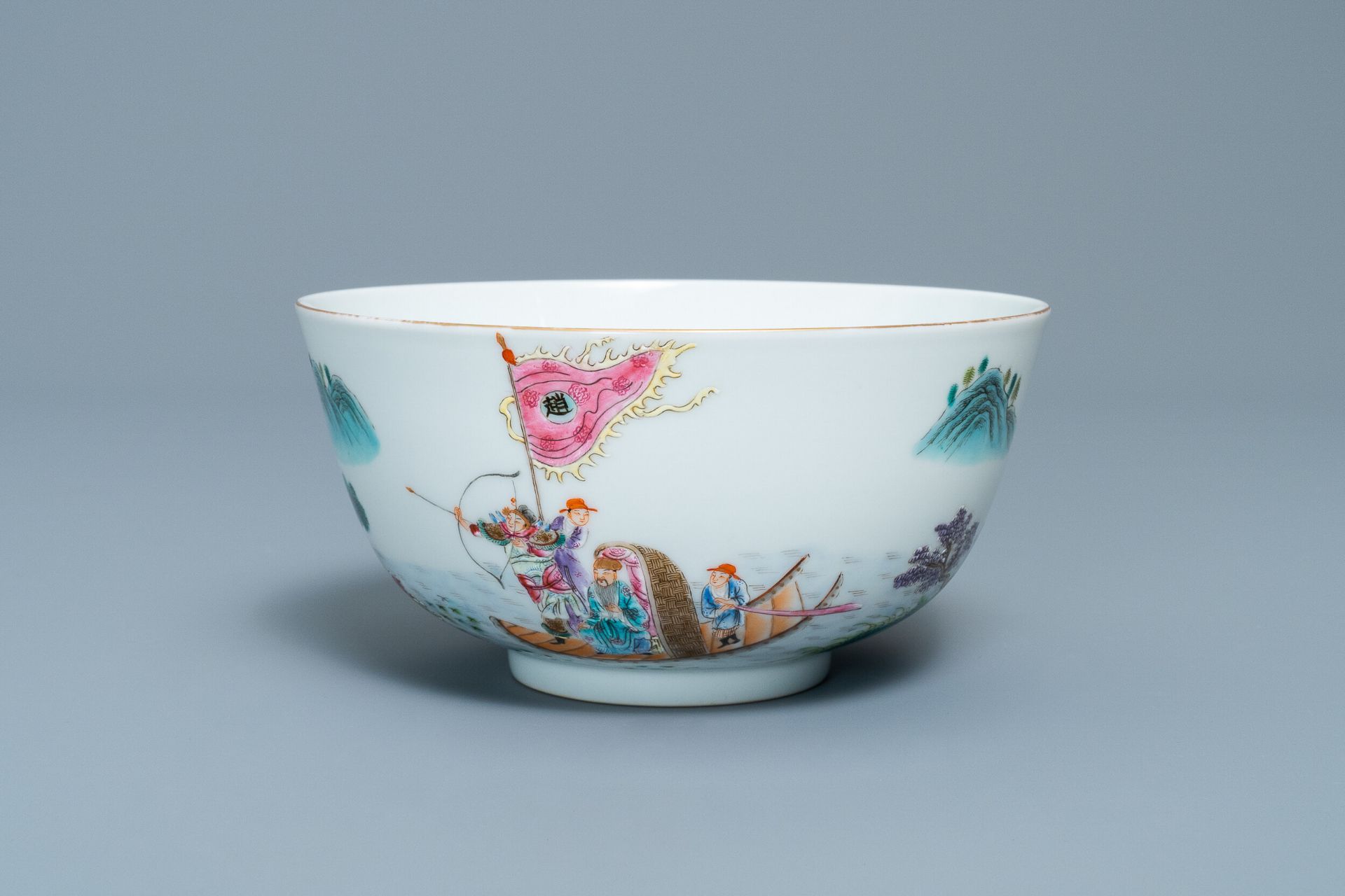 A fine Chinese famille rose bowl with figures in a river landscape, Qianlong mark, 20th C.