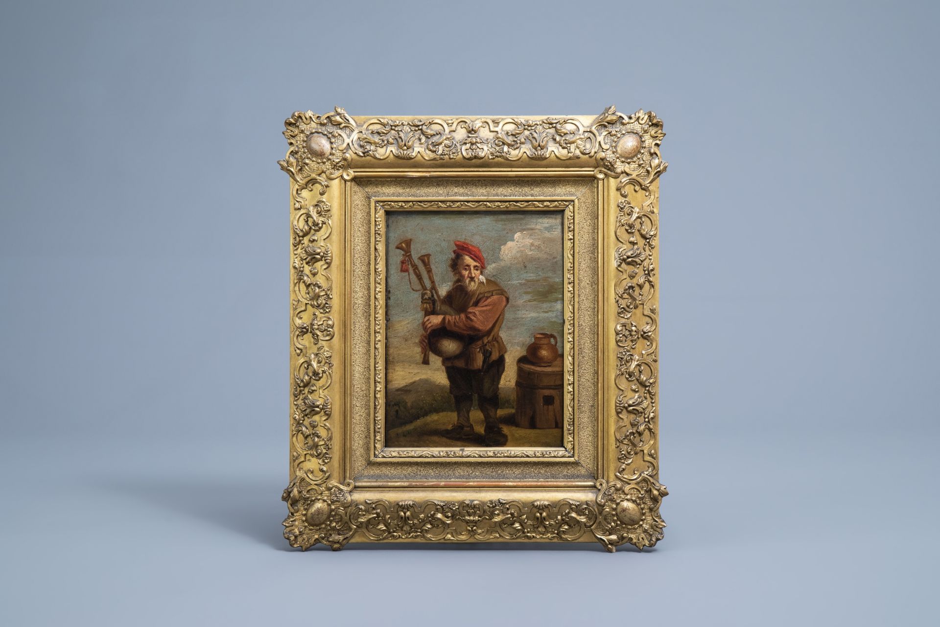 Flemish school, follower of Abraham Teniers (1629-1670): A peasant playing a bagpipe, 18th C. - Image 2 of 3