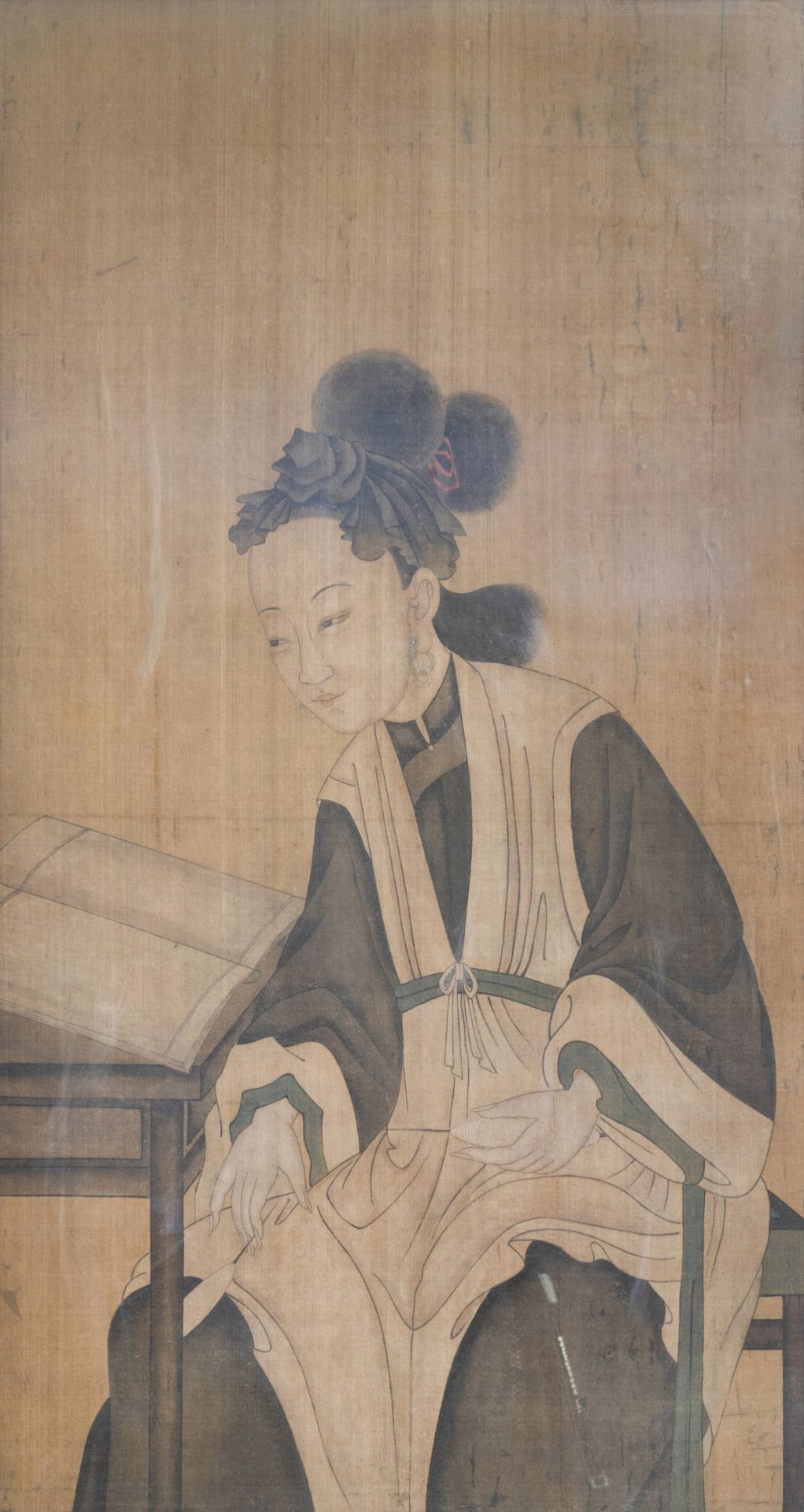 Chinese school, ink and colours on silk, 18/19th C.: A reading lady