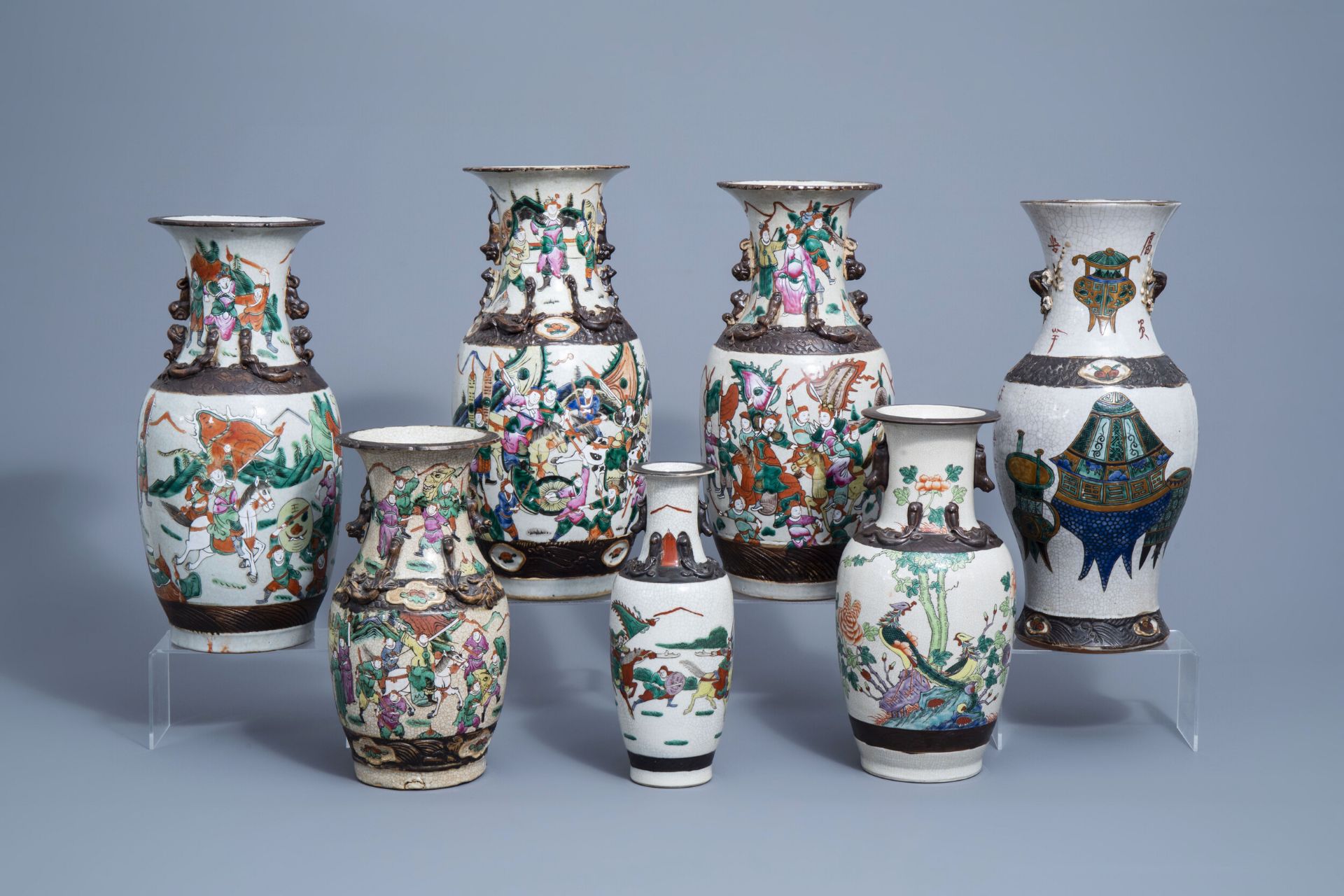 Seven various Chinese Nanking crackle glazed famille rose and verte vases, 19th/20th C.