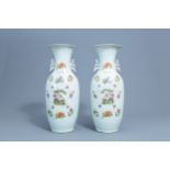 A pair of Chinese famille rose vases with birds and flowers, 19th/20th C.