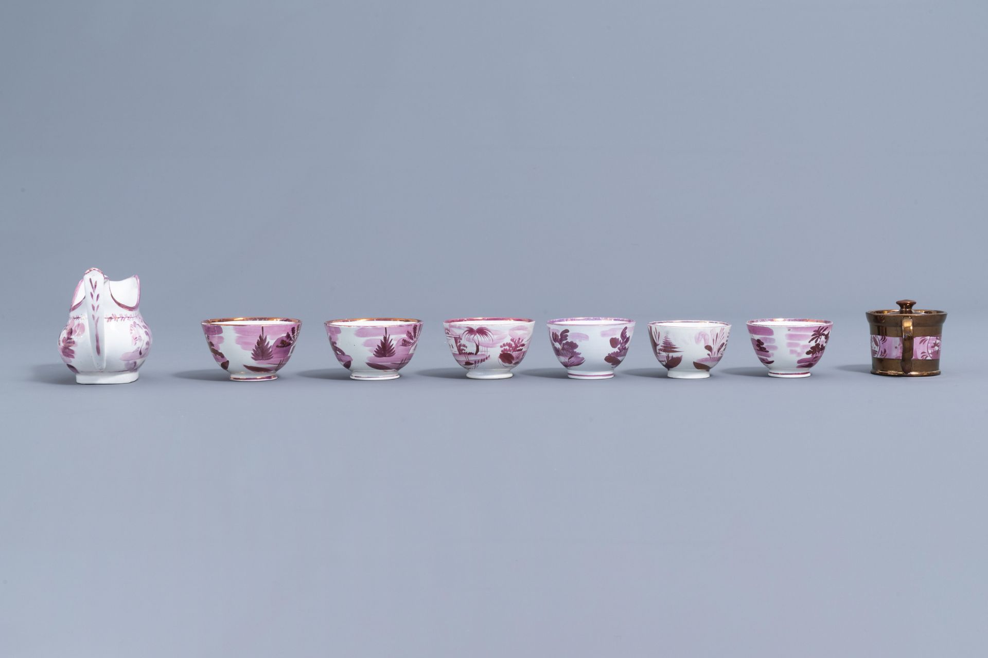 A varied collection of English pink lustreware items with a cottage in a landscape, 19th C. - Image 26 of 50