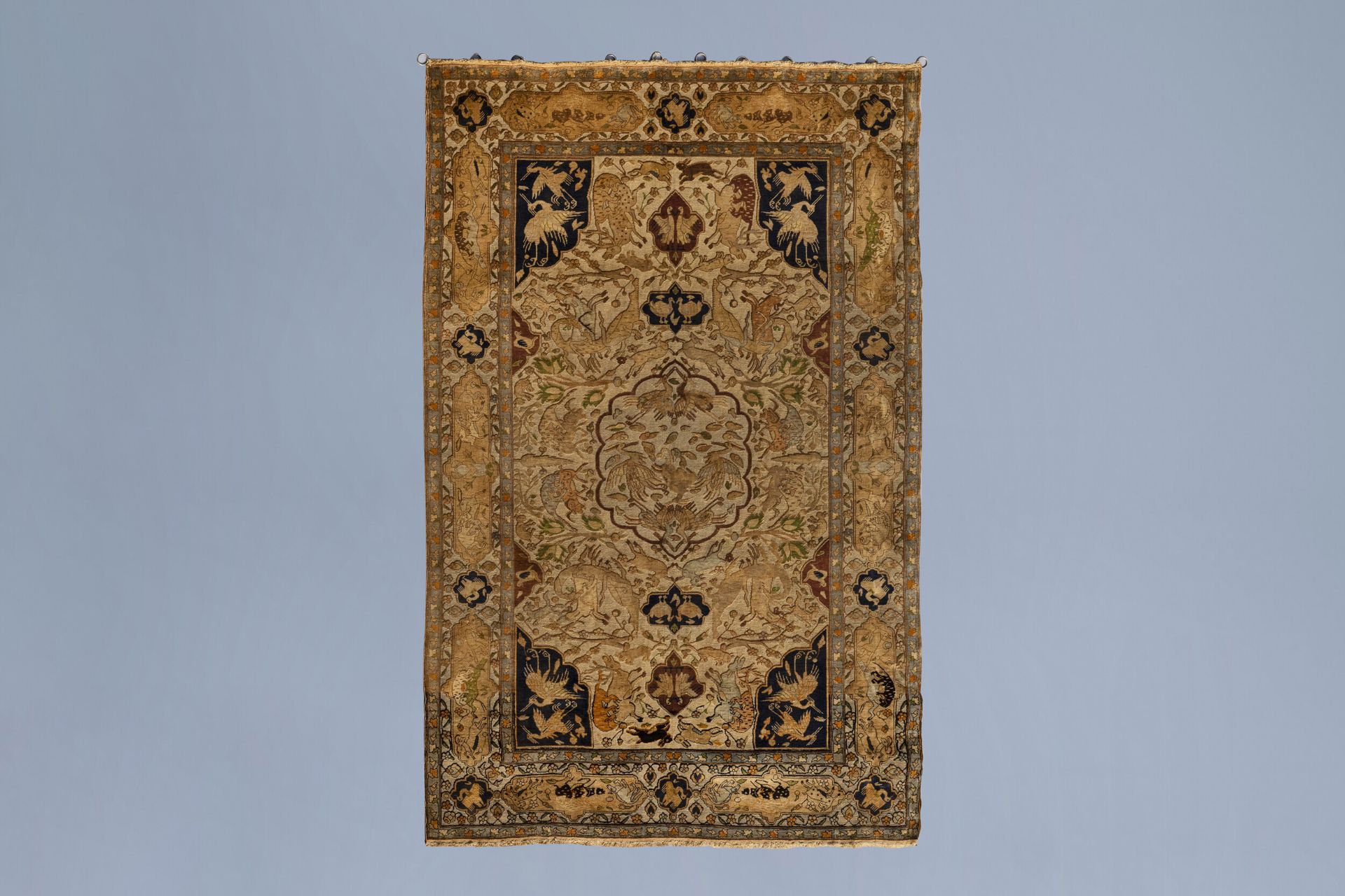 A lavish Oriental rug with animals and floral design, silk and gold thread on cotton, 19th C.