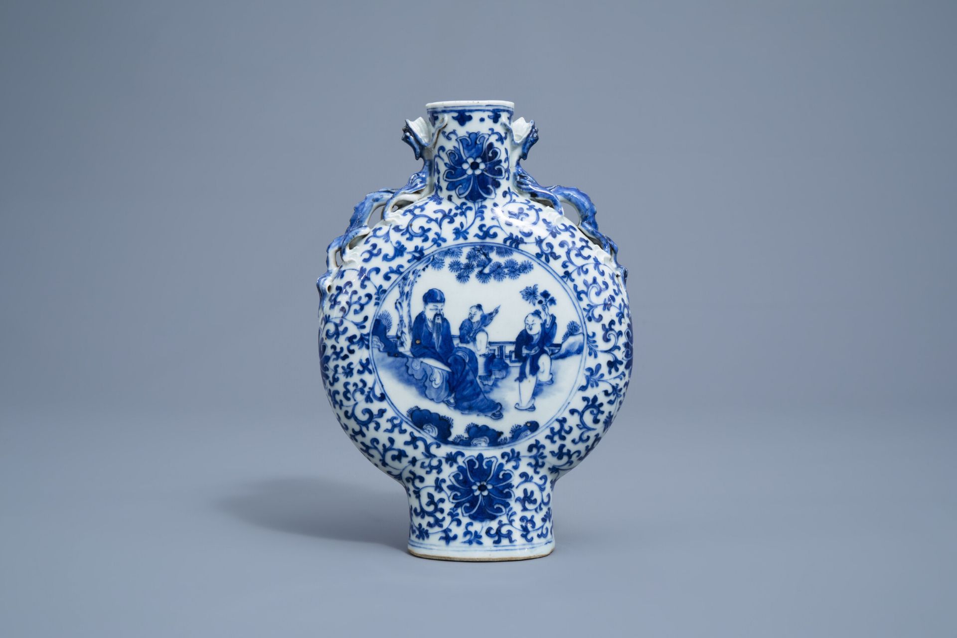 A Chinese blue and white moonflask with figures and a bird, 19th C.