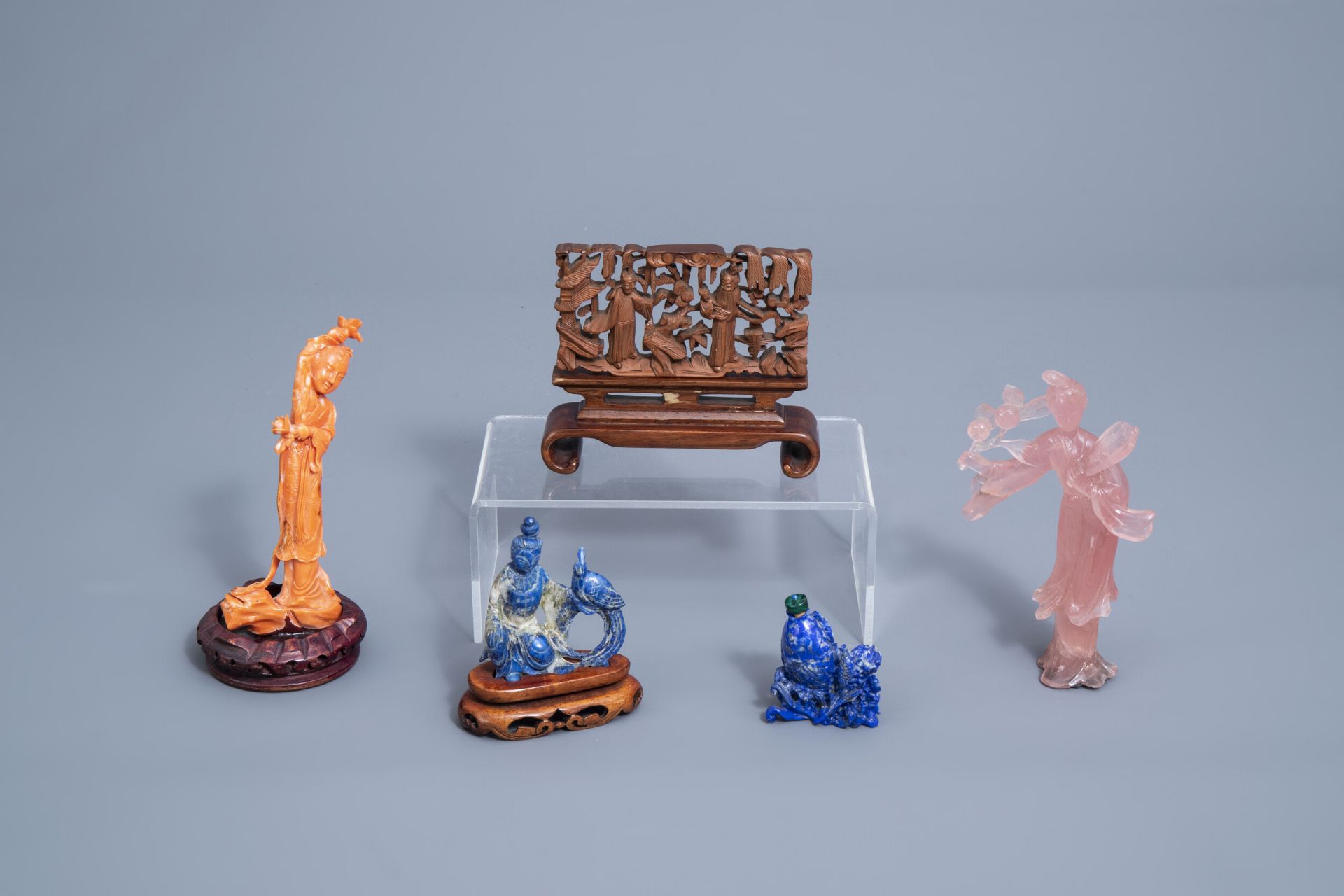 Five various Chinese lapis lazuli, coral, quartz and wood carvings, 19th/20th C.