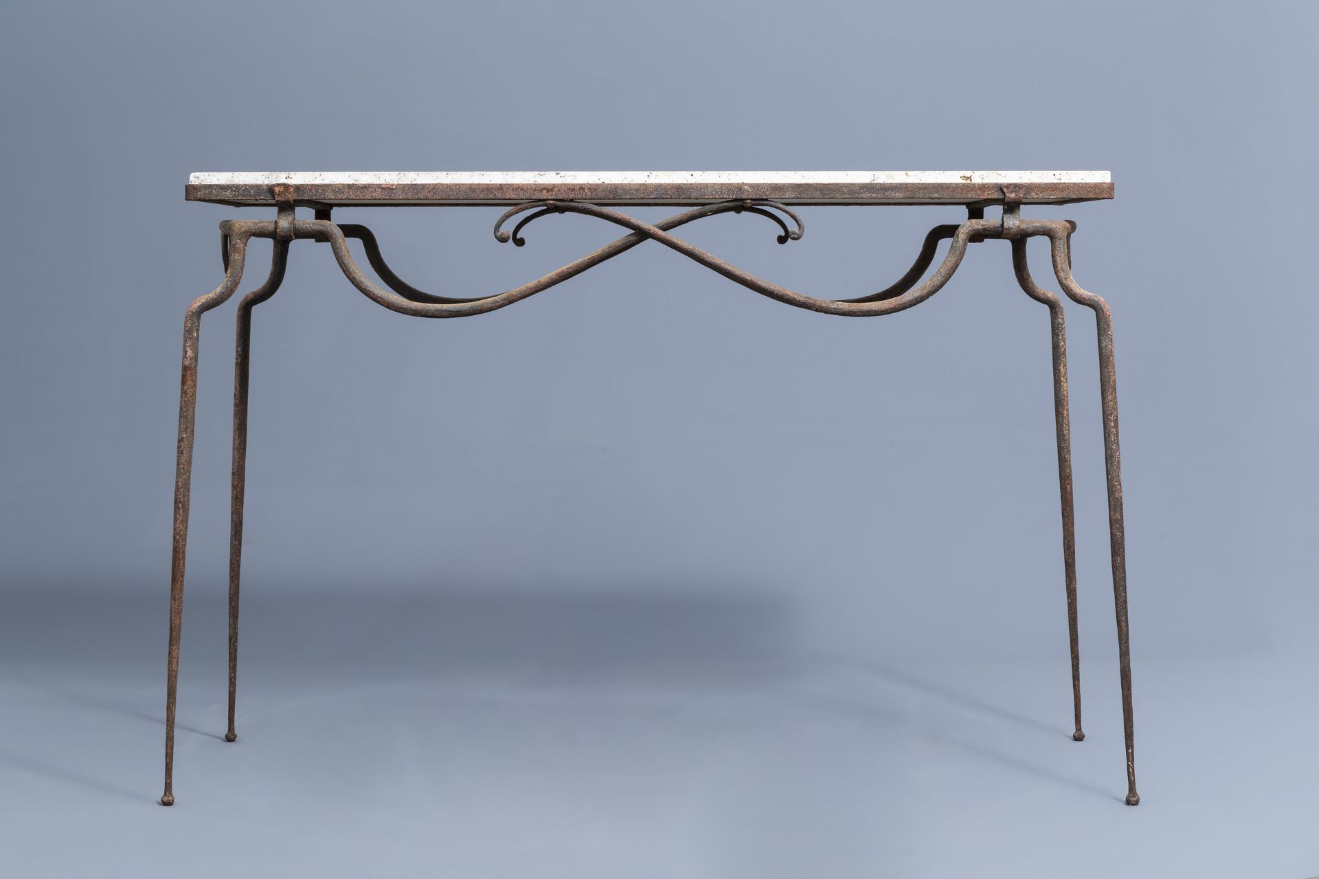 Attr. to RenŽ Prou (1889-1947): A wrought iron console with 'pierre de Bourgogne' top, mid 20th C. - Image 2 of 9