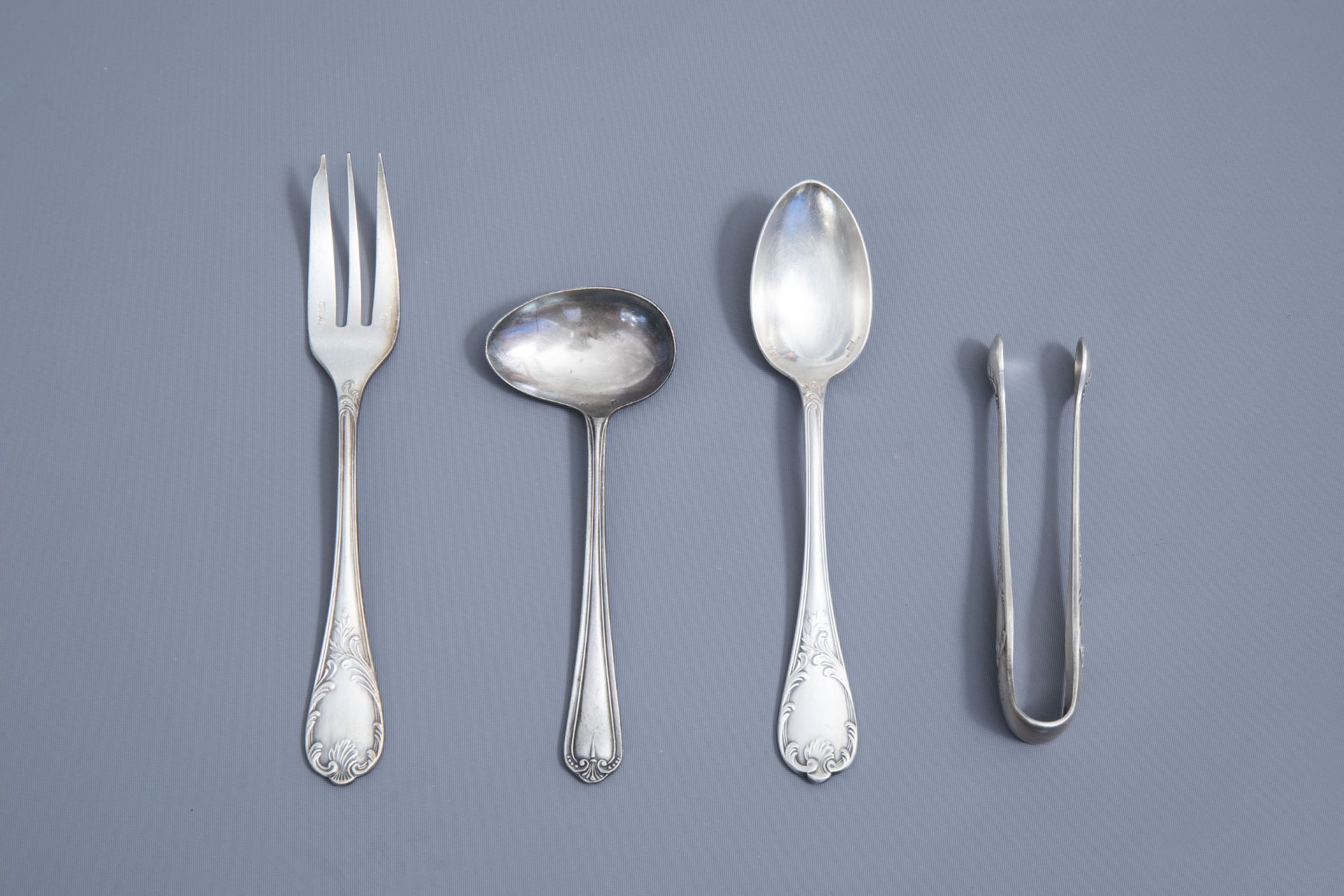 A French 65-piece silver plated rococo style cutlery set, model Marly, Christofle, 20th C. - Image 2 of 32