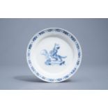 A blue and white pottery plate with a warrior on a griffin, probably Germany, 18th C.