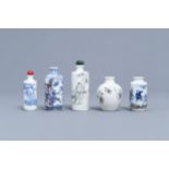 A collection of ten Chinese porcelain, glass and lapis lazuli snuff bottles, 19th/20th C.