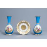 A pair of French 'bleu celeste' ground vases with gallant scenes and a German gilt charger, 20th C.