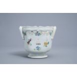 A Chinese famille rose armorial cooler with floral design, Qianlong
