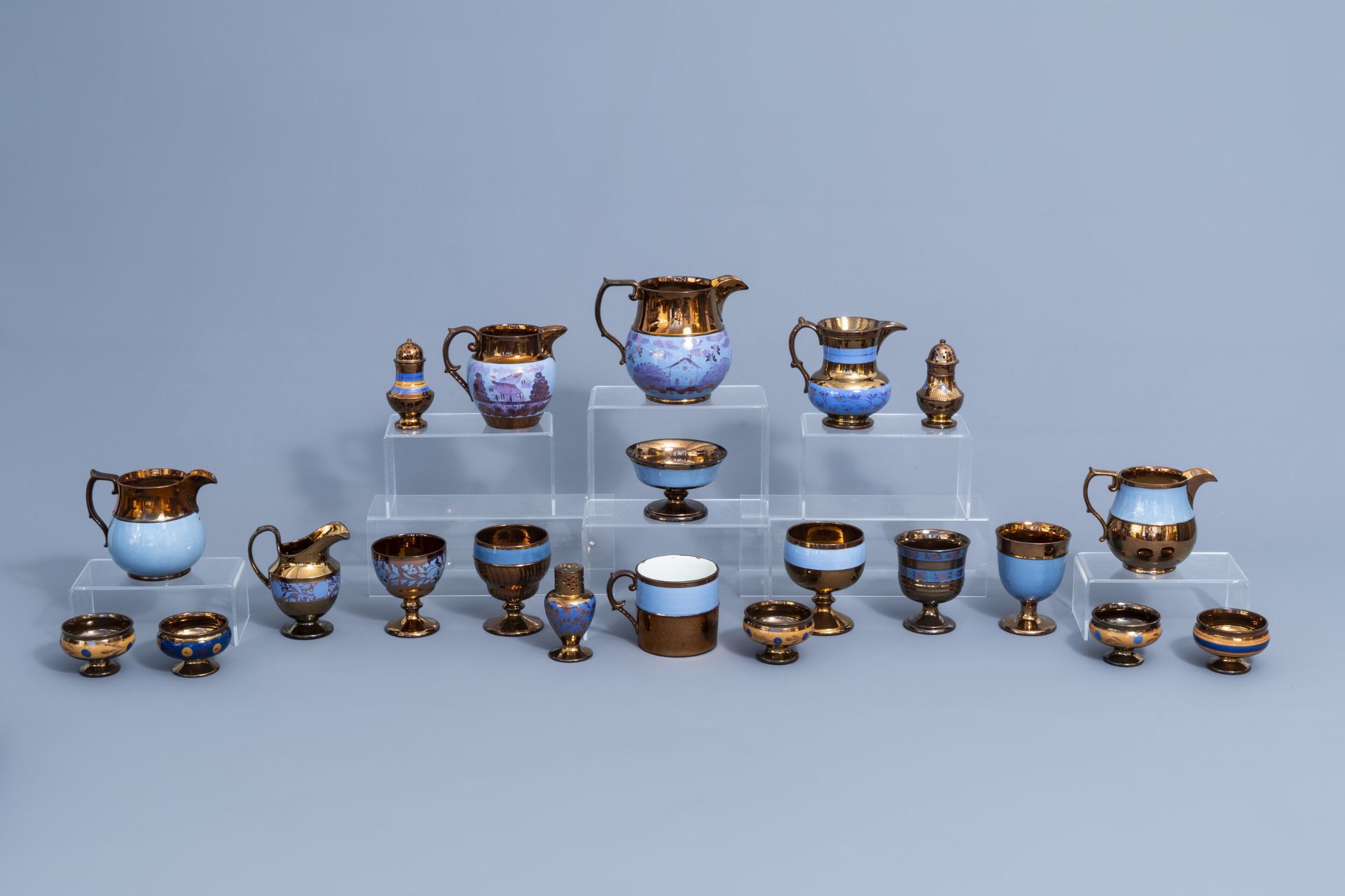 A varied collection of English lustreware items with blue design, 19th C. - Image 2 of 50